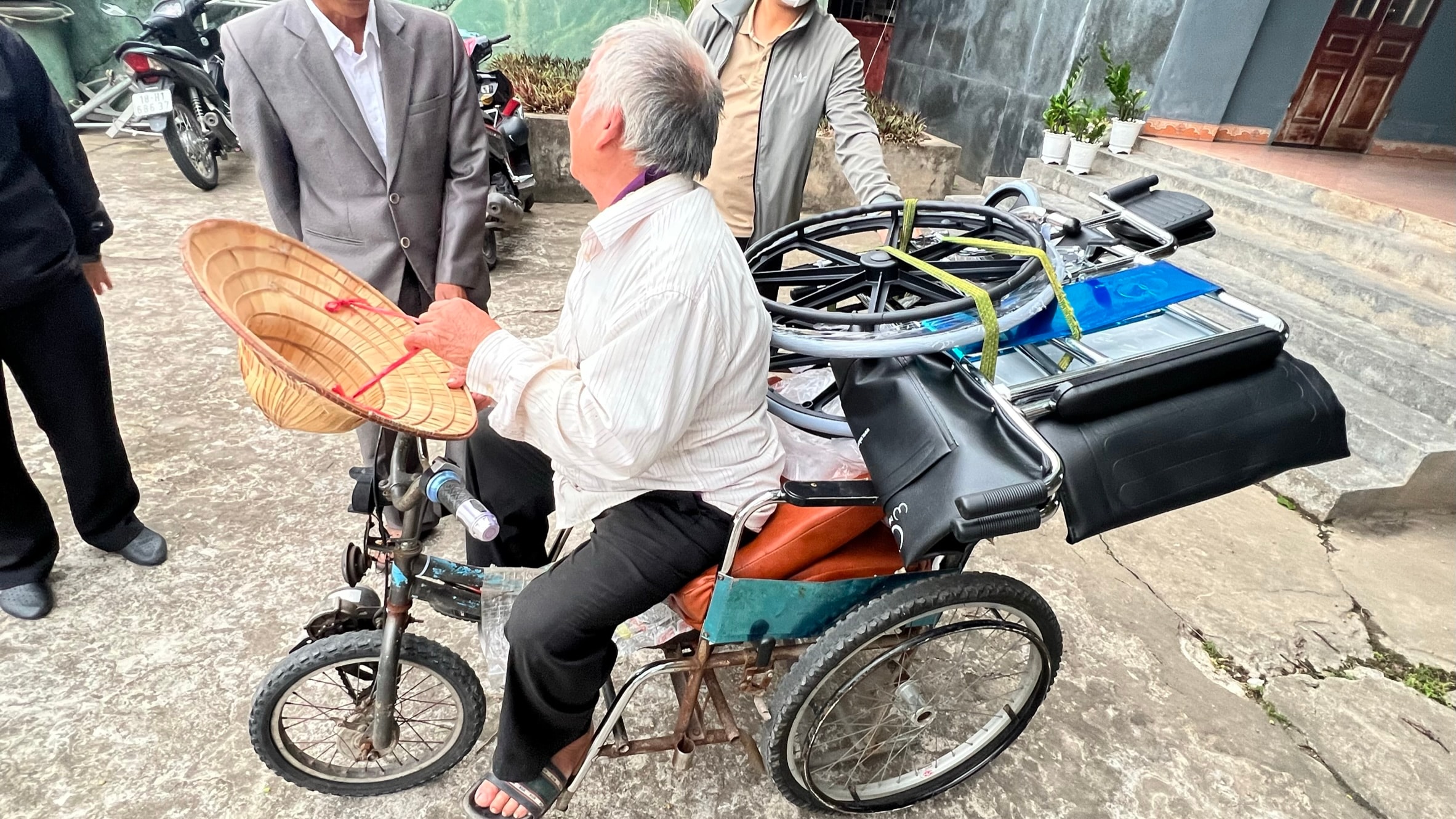 Wheelchairs Of Love — nonprofit volunteers group photo