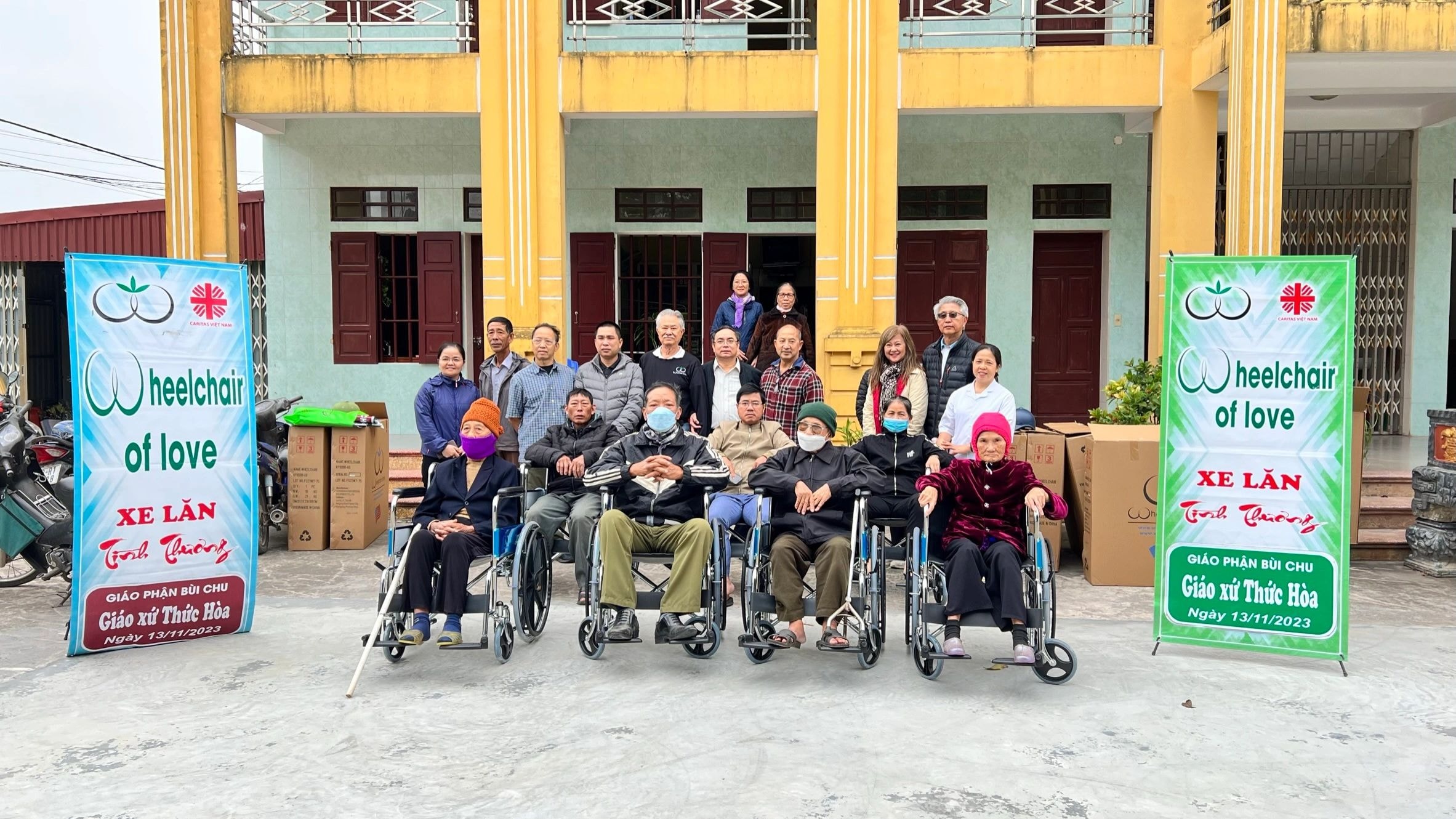 Wheelchairs Of Love — group photo at charity event